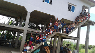 photo of students on stairway at mission school in Cambodia