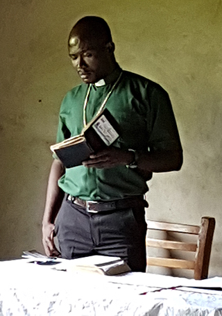 image of Nigerian man with Bible