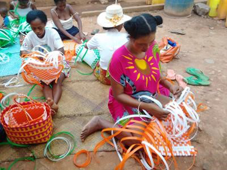 photo of women weaving baskets