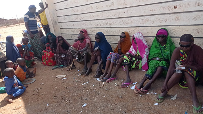 Kenyan villagers waiting for eye checkups