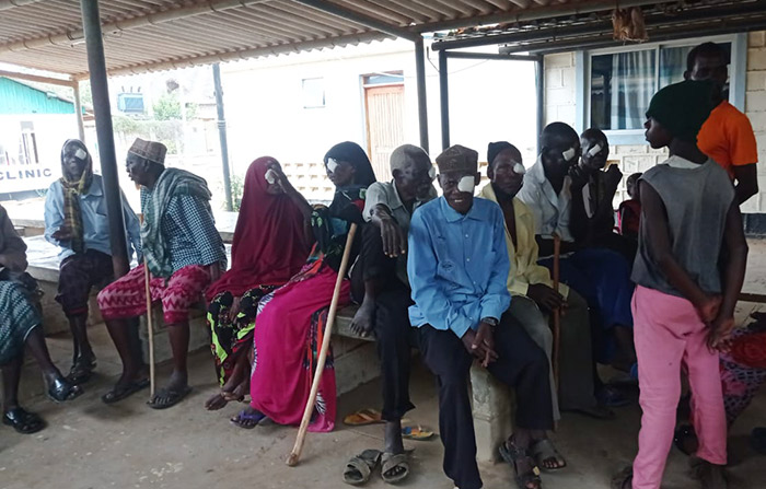 Kenyans waiting at Hola Hospital to have eye patches removed