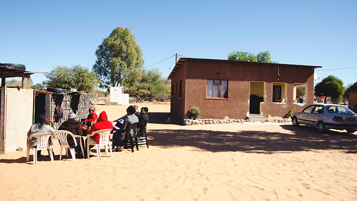 photo of a group in Botswana having a seated discussion