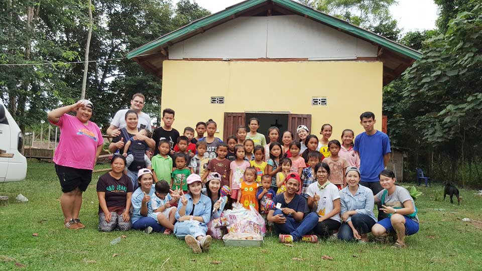 photo of missionaries with group from local Southeast Asia church