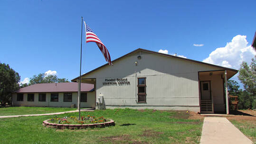 photo of building with American flag in front