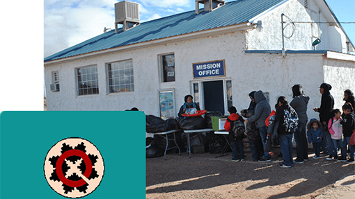 photo of Navaho mission office with Native Americans in front