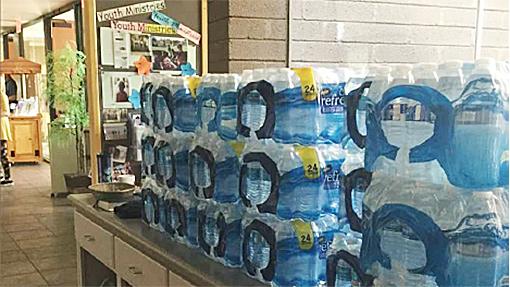stacks of bottled water containers