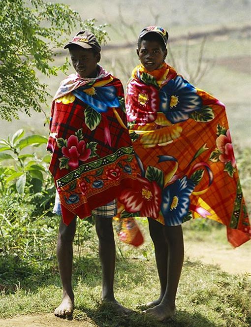 two men of the Bara tribe in Madagascar, wearing colorful robes