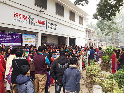 group of people in front of hospital in Bangladesh