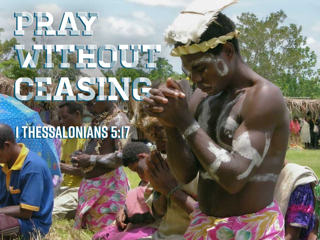 African villagers praying, wearing colorful clothing and tribal body paint, with text PRAY WITHOUT CEASING