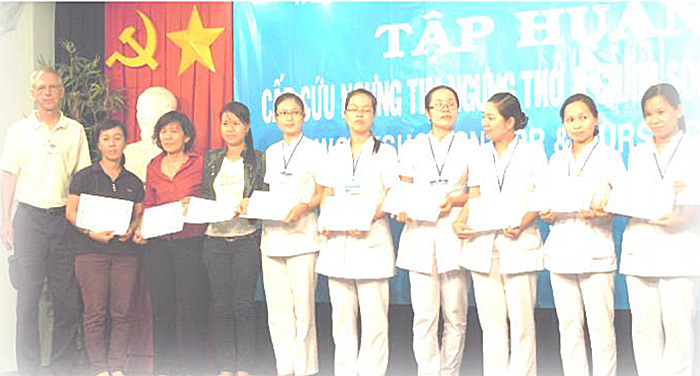 photo of Vietnamese nurses in white uniforms