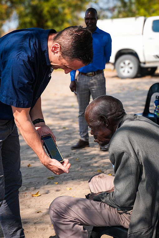two men looking a book