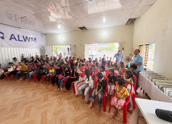 large group of students in room