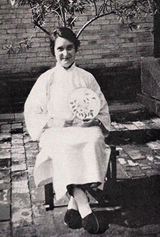 vintage photo of missionary in China holding fan