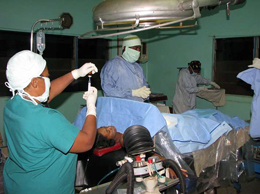 Doctors and nurses performing surgery