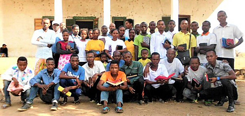 people posing for group photo
