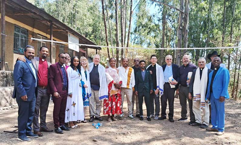 group of people in front of church in Ethiopia
