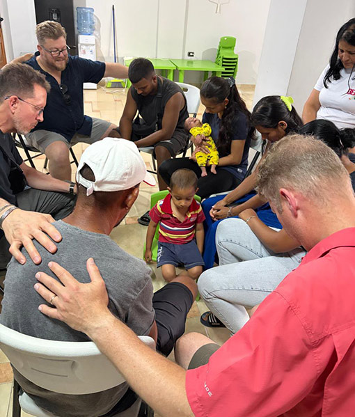 people praying together